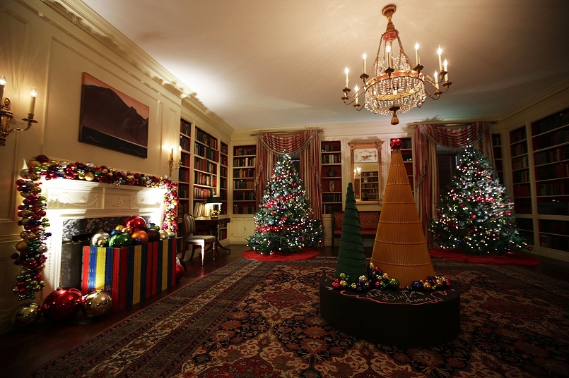 Holiday decorations are seen in the library of the White House.