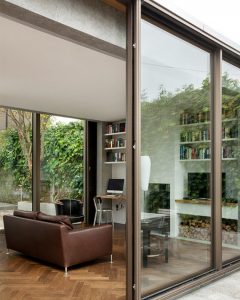 Beautiful Glazed House Feels Like a Garden's Extension